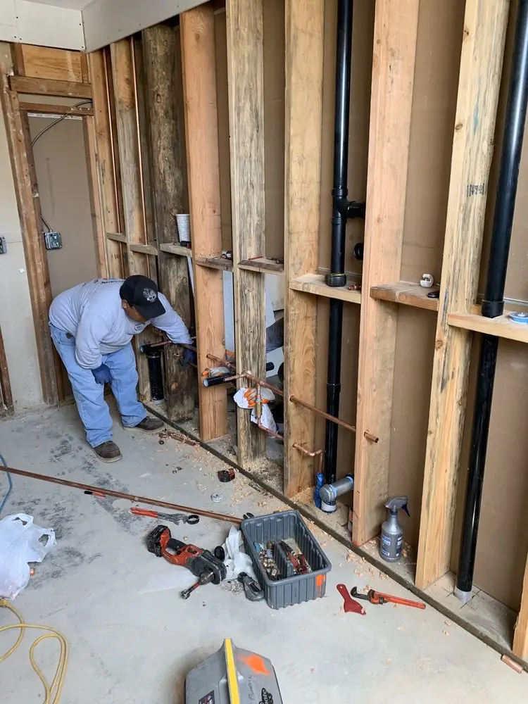 Commercial rough-in plumbing for Water Heater Replacement in Downtown Bryan